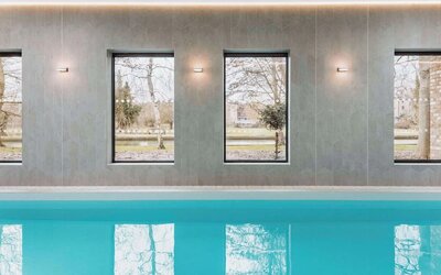 Indoor pool area at Graduate By Hilton Cambridge.