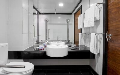 Guest bathroom at Leonardo Royal Hotel London Tower Bridge.