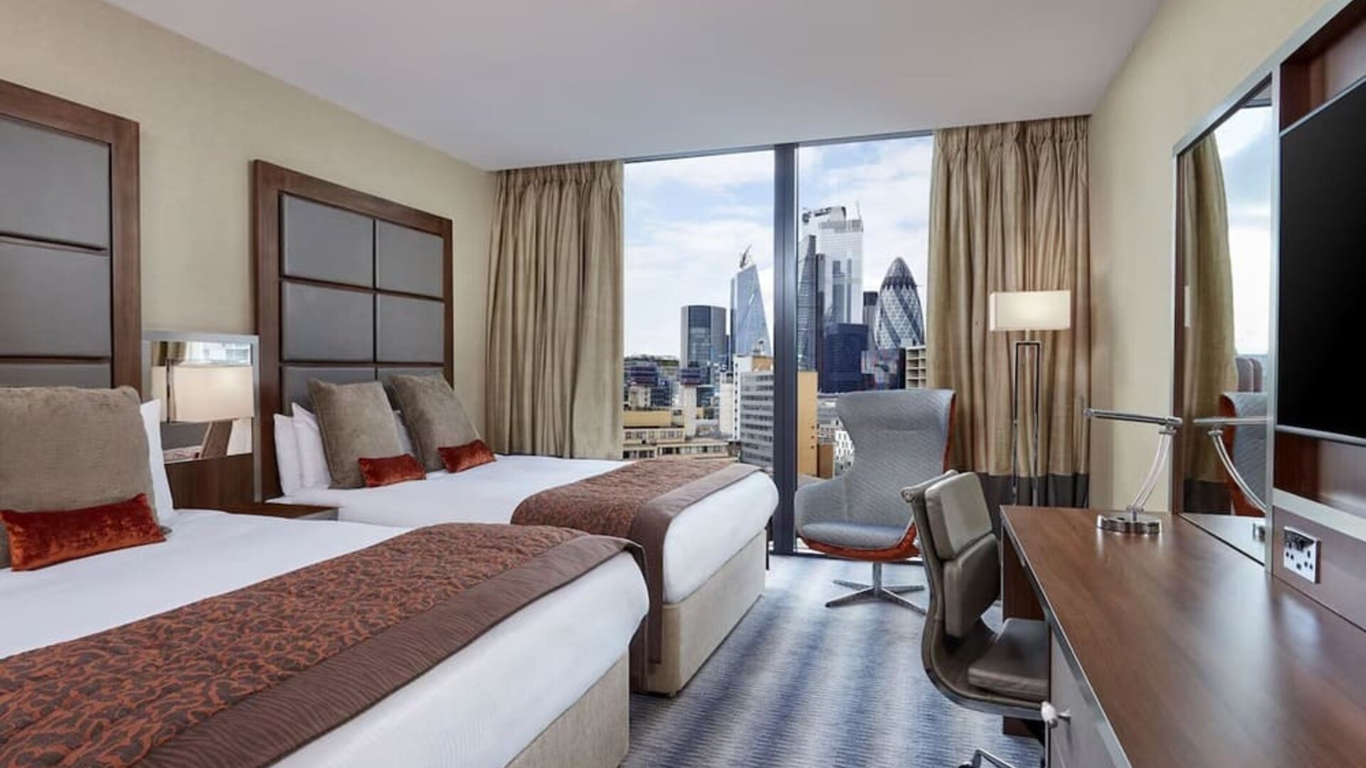 Day use twin room with work desk at Leonardo Royal Hotel London Tower Bridge.