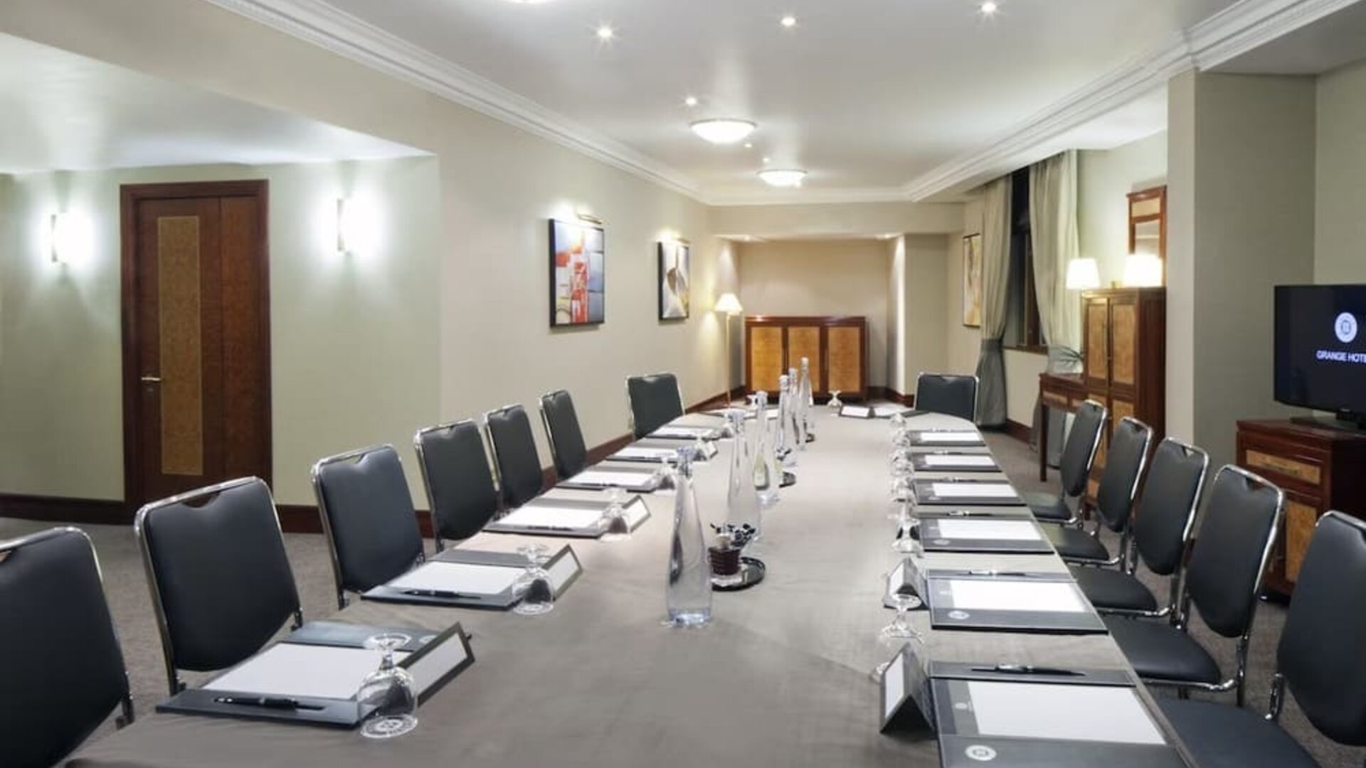 Professional meeting room at Leonardo Royal Hotel London City.