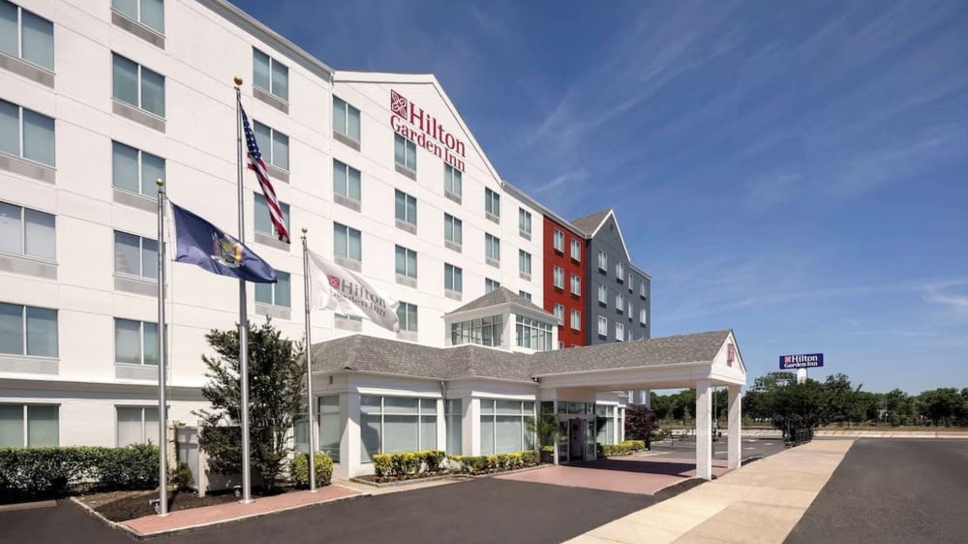 Hotel exterior at Hilton Garden Inn Queens/JFK Airport.