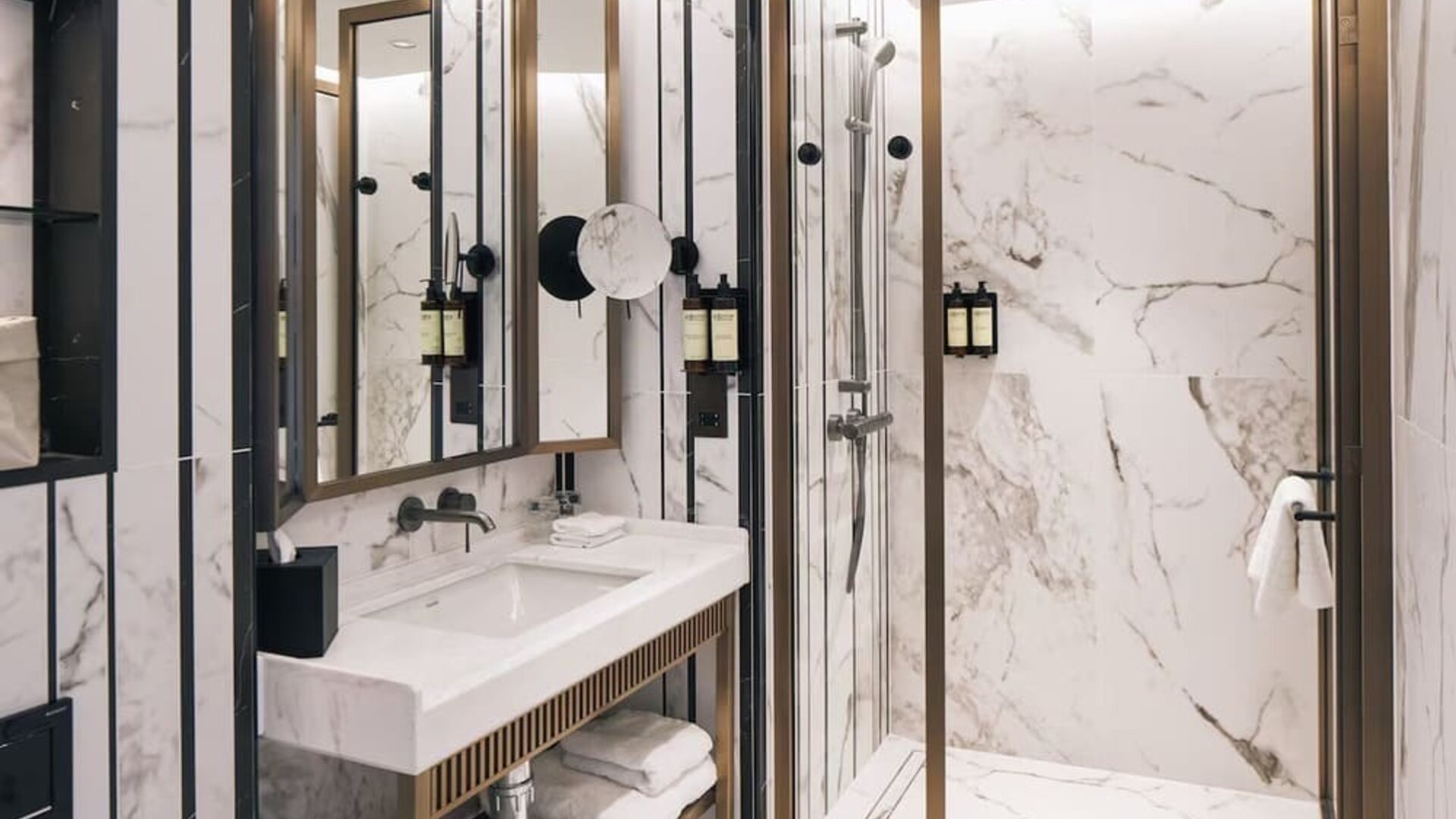 Guest bathroom with shower and free toiletries at Page8, Page Hotels.