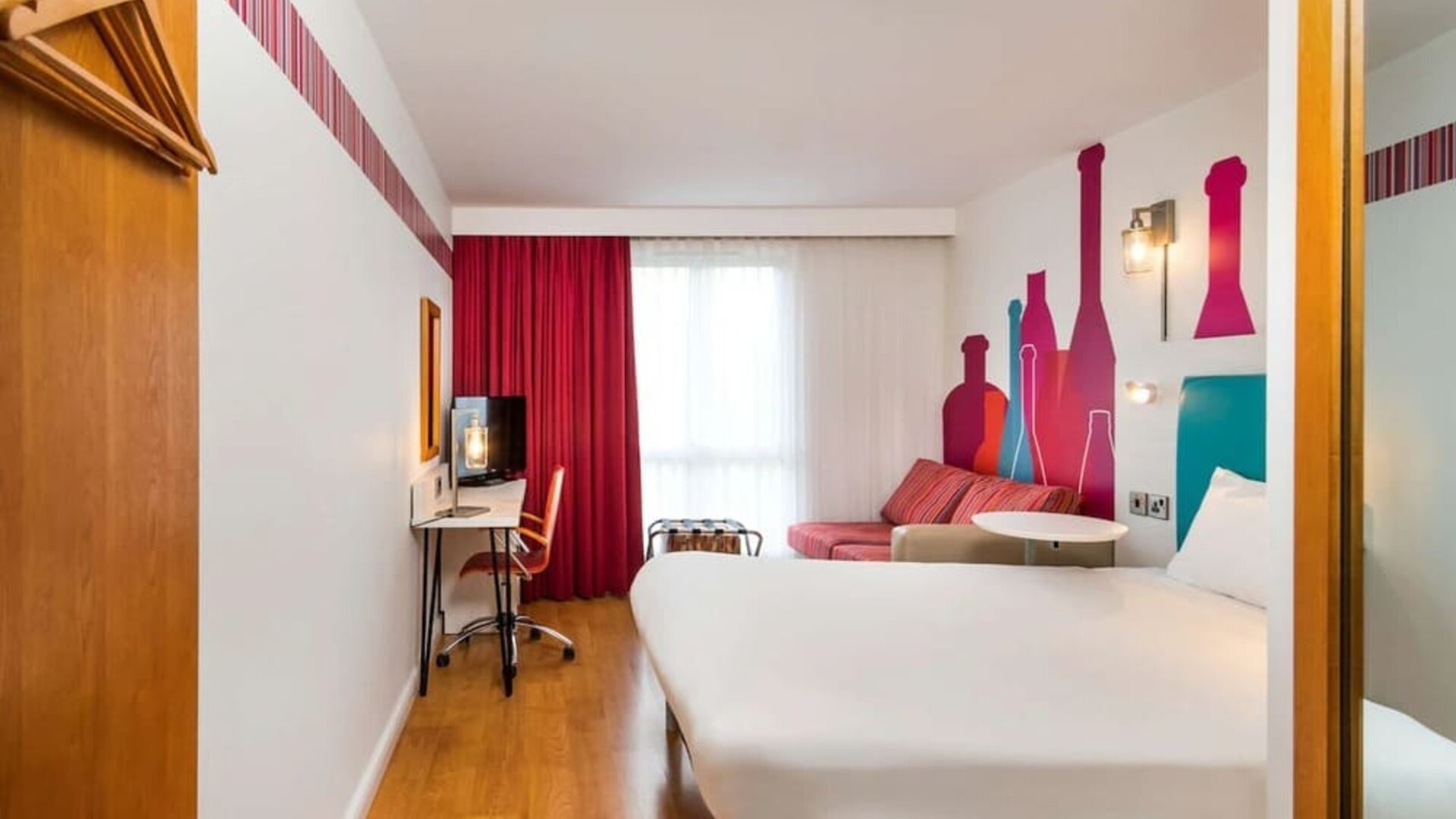 Day use family room with work desk and convertible sofa at Ibis Styles Barnsley.