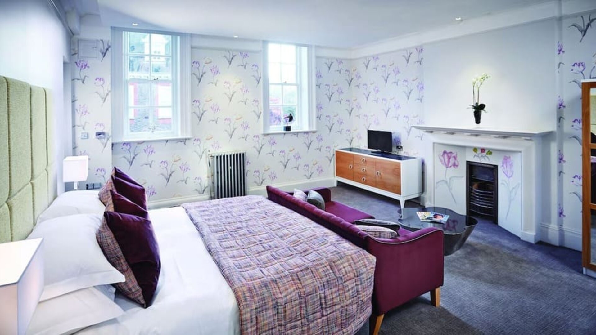 Day use room with king bed and sofa at Barnett Hill Hotel.