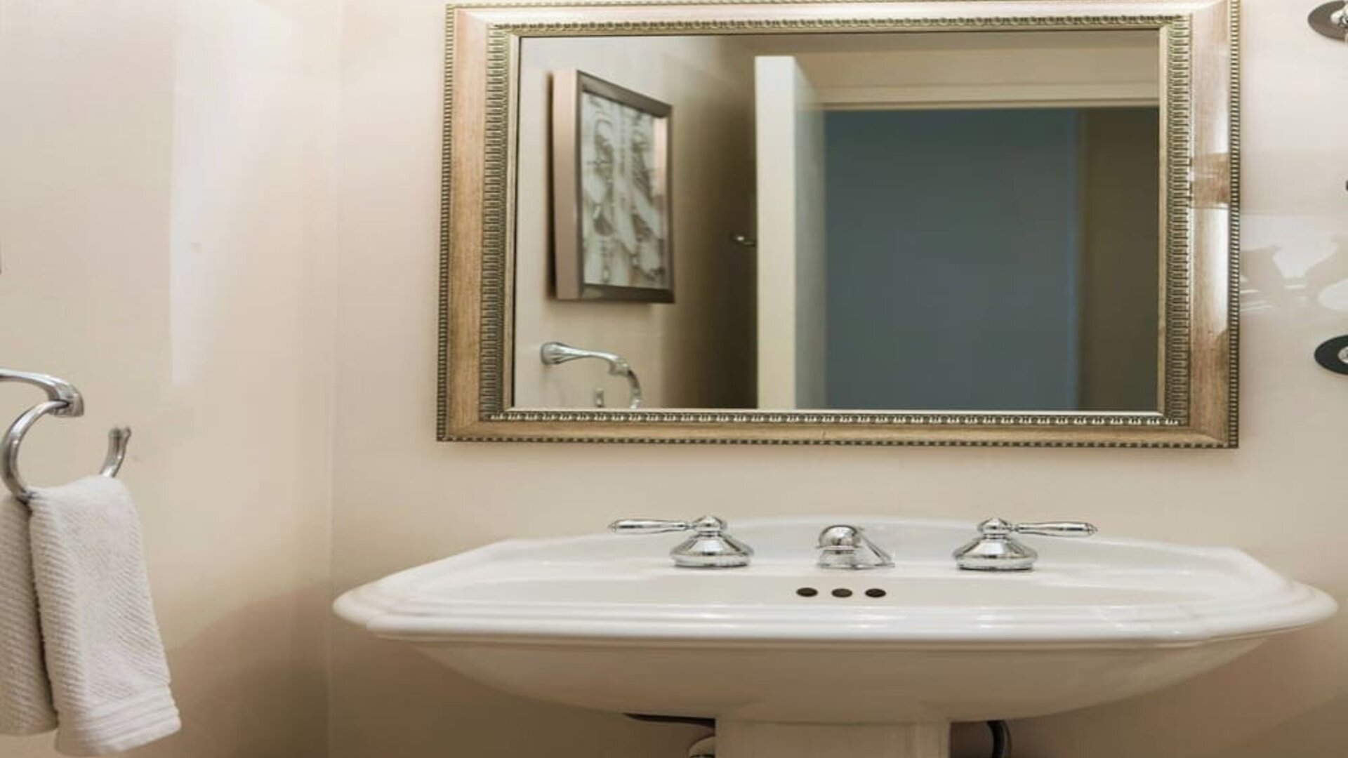 Guest bathroom with shower at Renaissance Newark Airport Hotel.