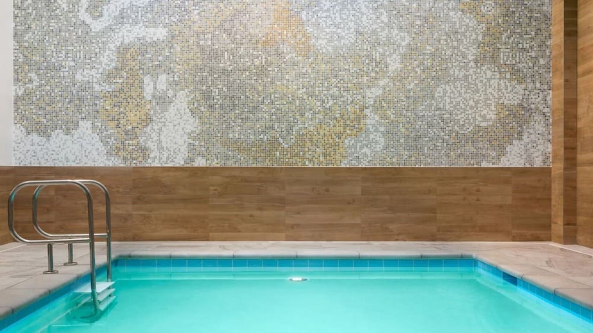 Refreshing indoor pool at AC Hotel By Marriott SFO/Oyster Point Waterfront.