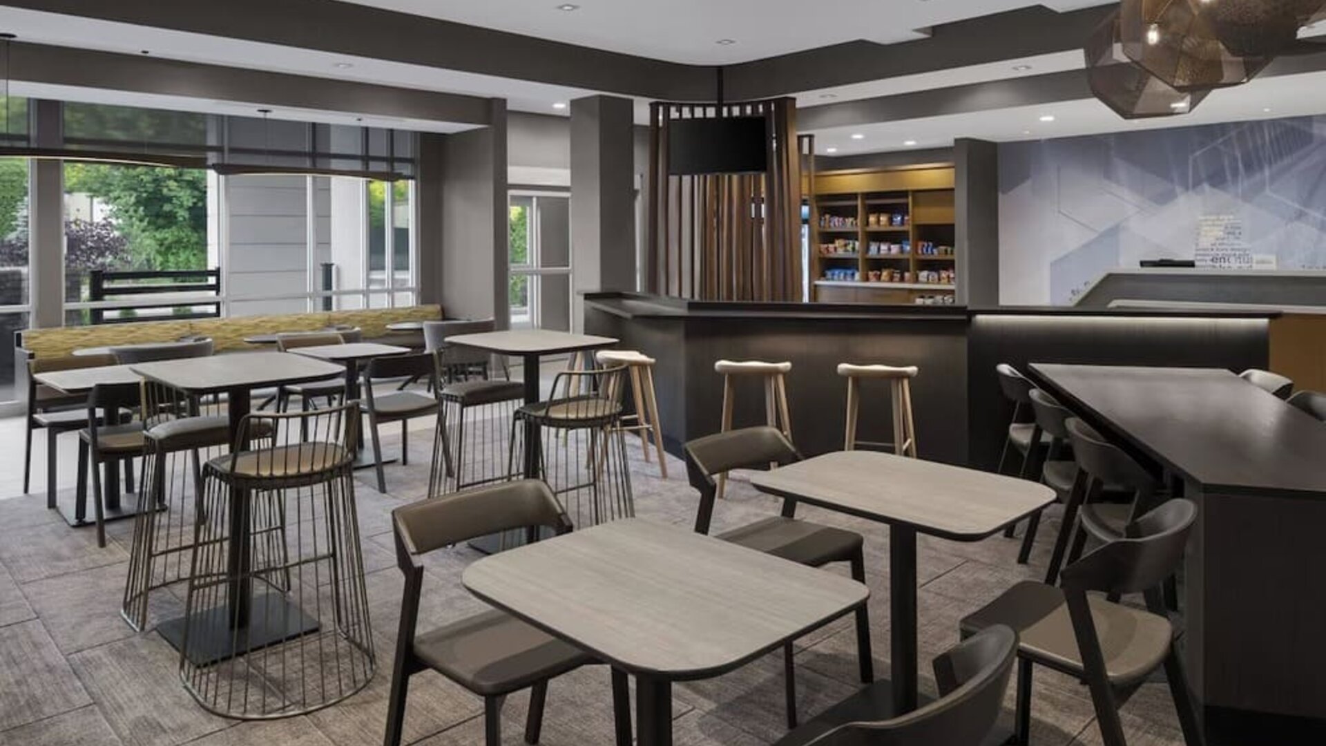 Lobby and coworking lounge at SpringHill Suites Tuckahoe.