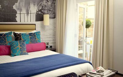 King bed at Indigo London-Paddington Hotel.