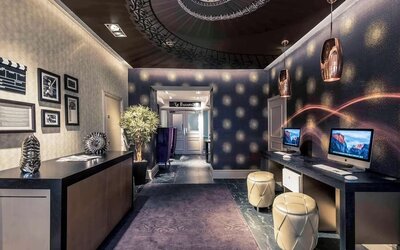 Business center with computers and printers at Mercure London Hyde Park Hotel.