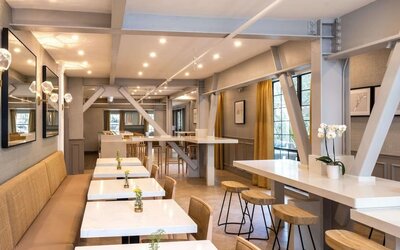 Dining area perfect for coworking at The Inn At Saratoga, Tapestry Collection By Hilton.