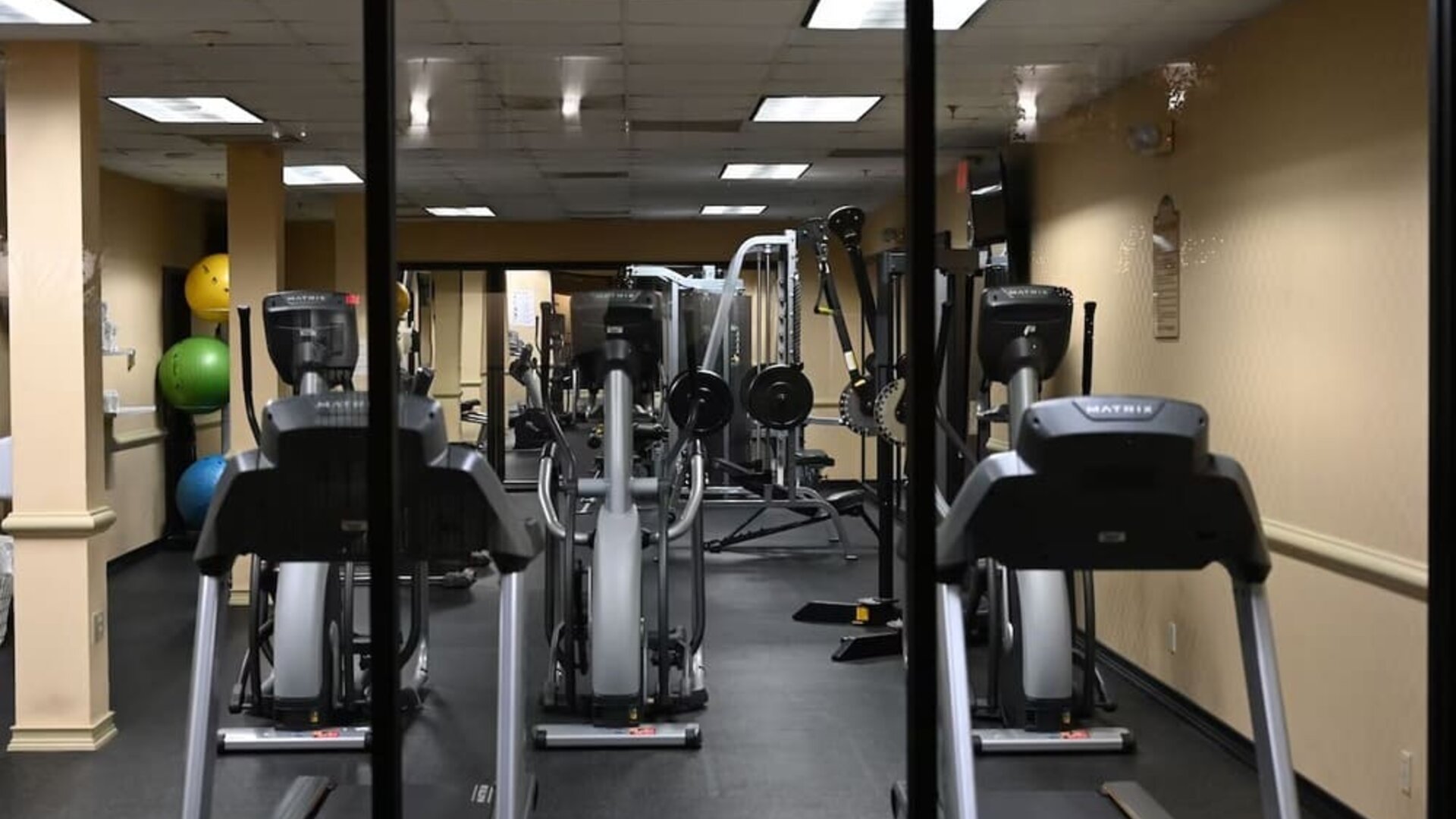 Fitness center available at Atrium Hotel & Suites.