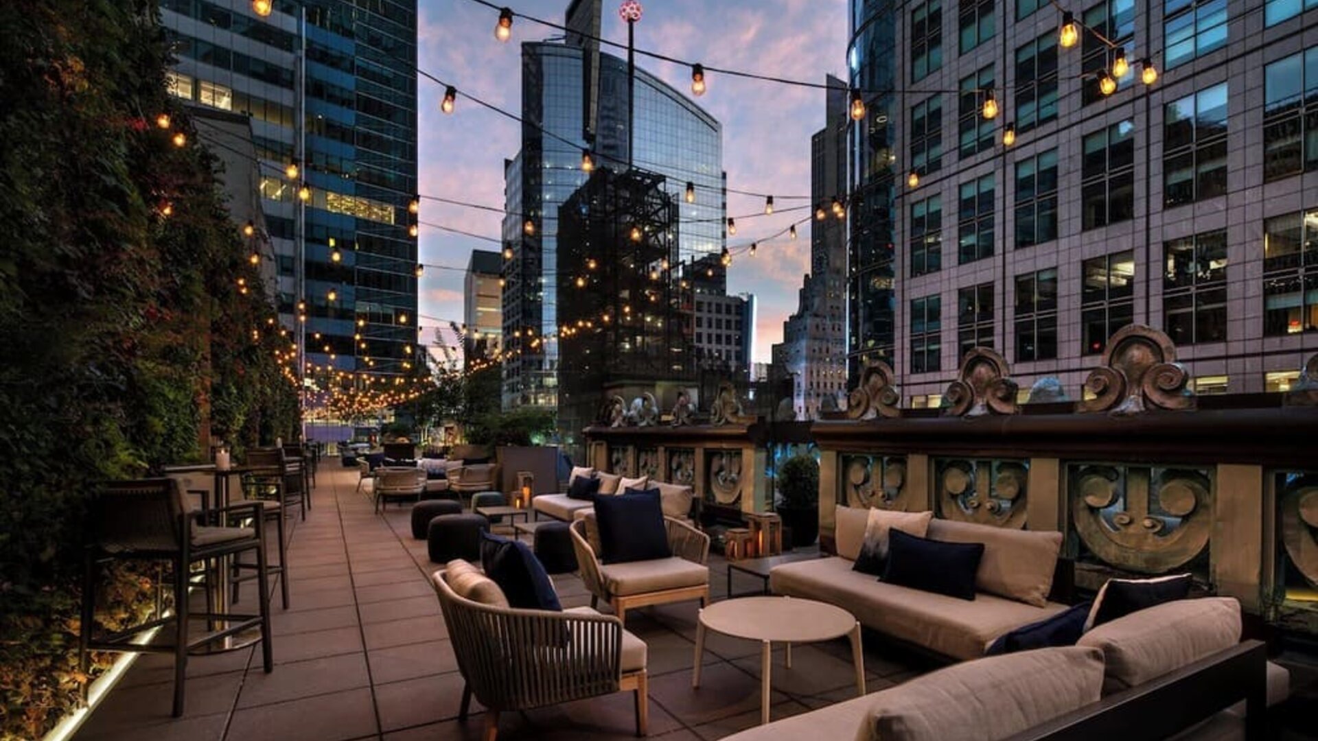 Rooftop terrace seating at The Knickerbocker Hotel.