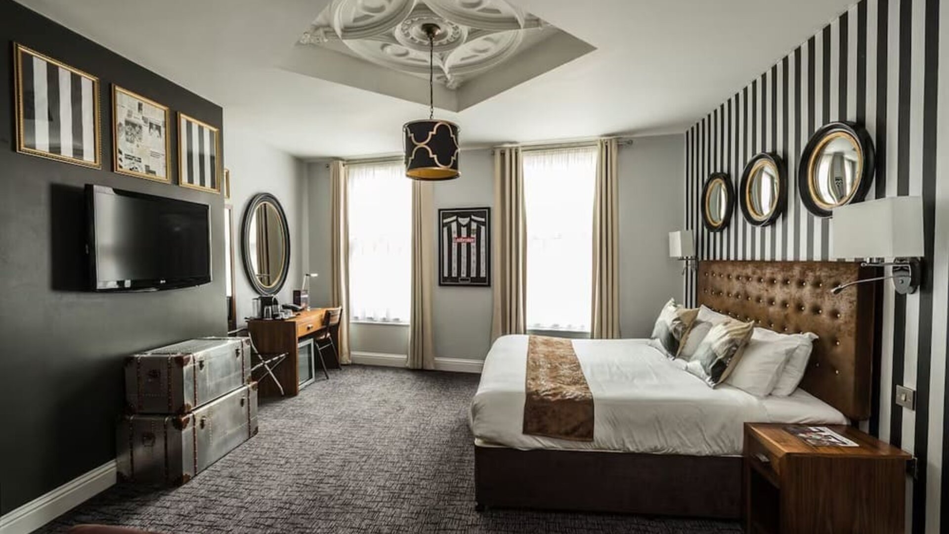 Bright and spacious day use room with TV and work station at Mercure Nottingham City Centre Hotel.