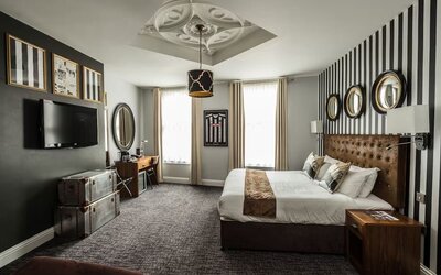 Bright and spacious day use room with TV and work station at Mercure Nottingham City Centre Hotel.