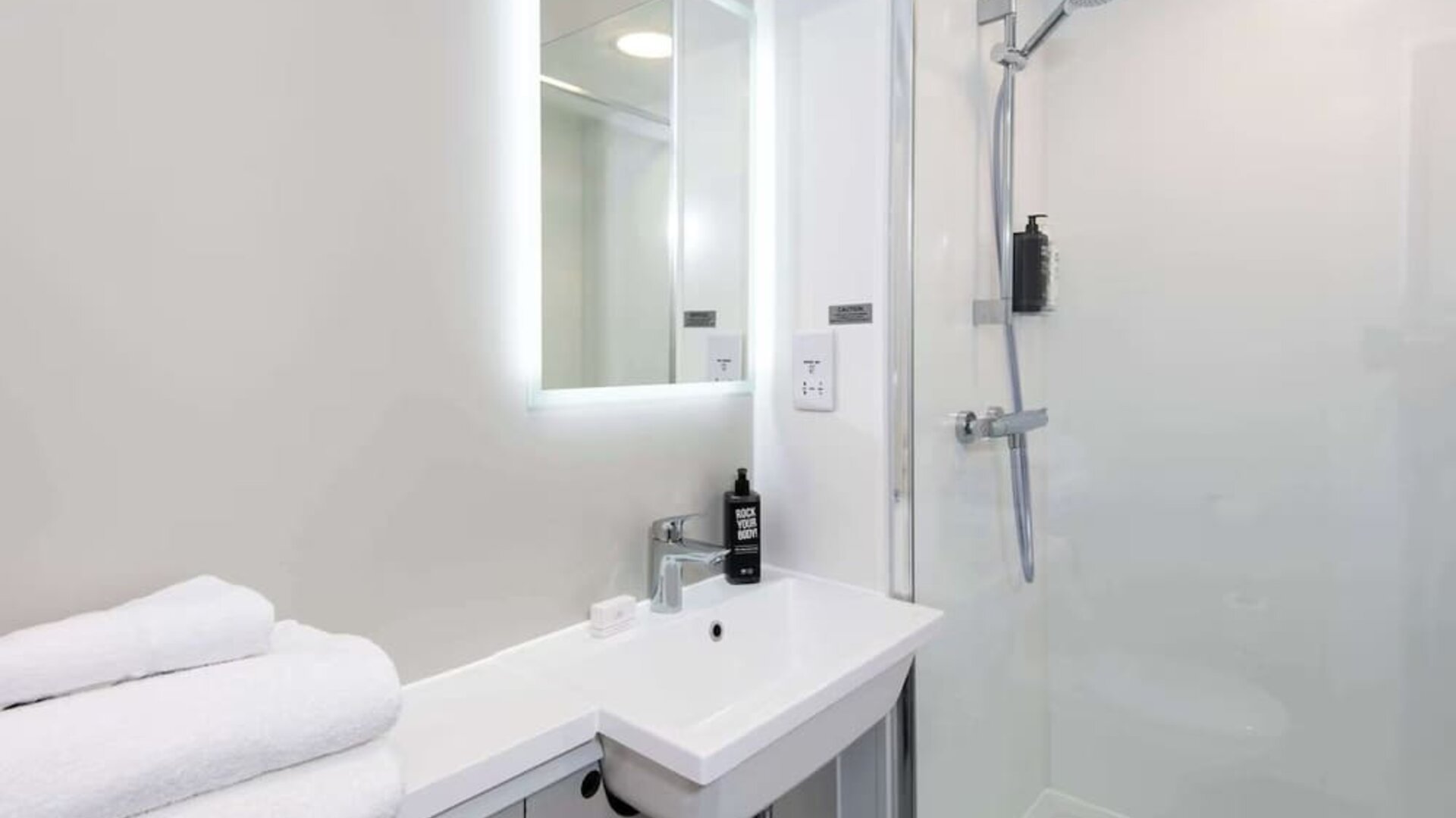 Private guest bathroom with shower at Ibis Plymouth.