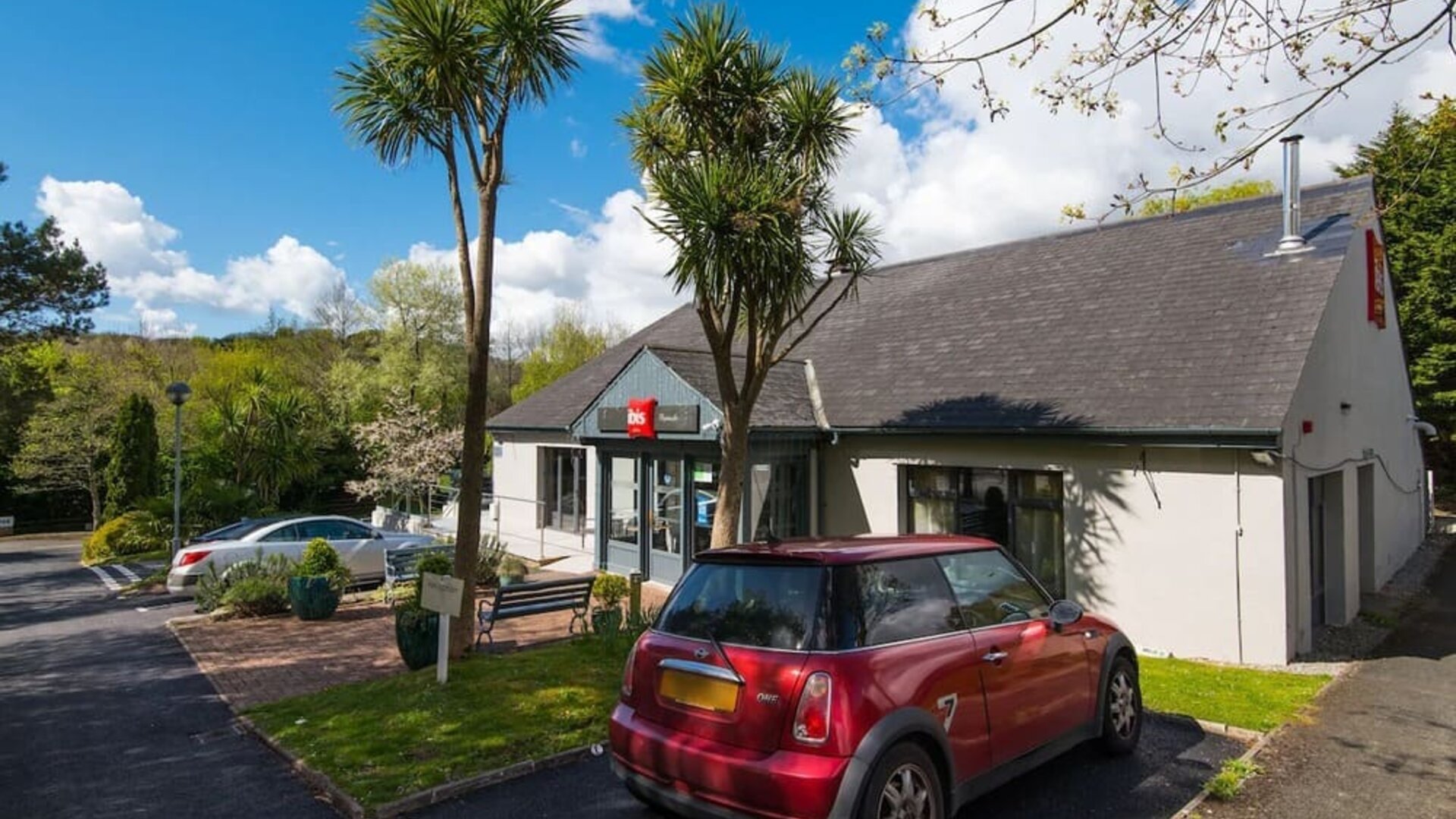Hotel entrance and parking area at Ibis Plymouth.