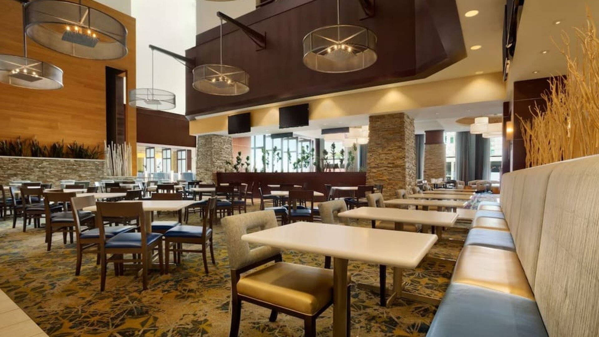 Dining area perfect for coworking at Embassy Suites By Hilton Denver Downtown Convention Center.