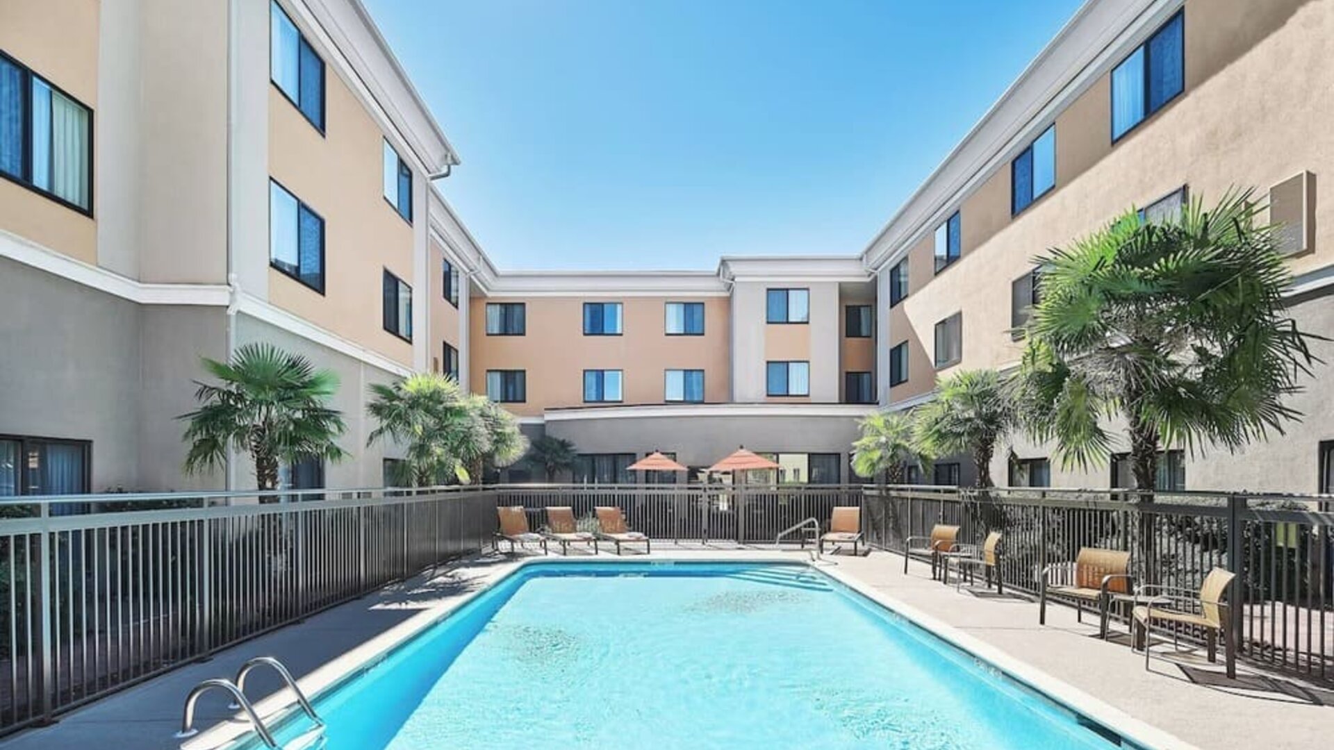 Refreshing outdoor pool at Courtyard Bossier City.