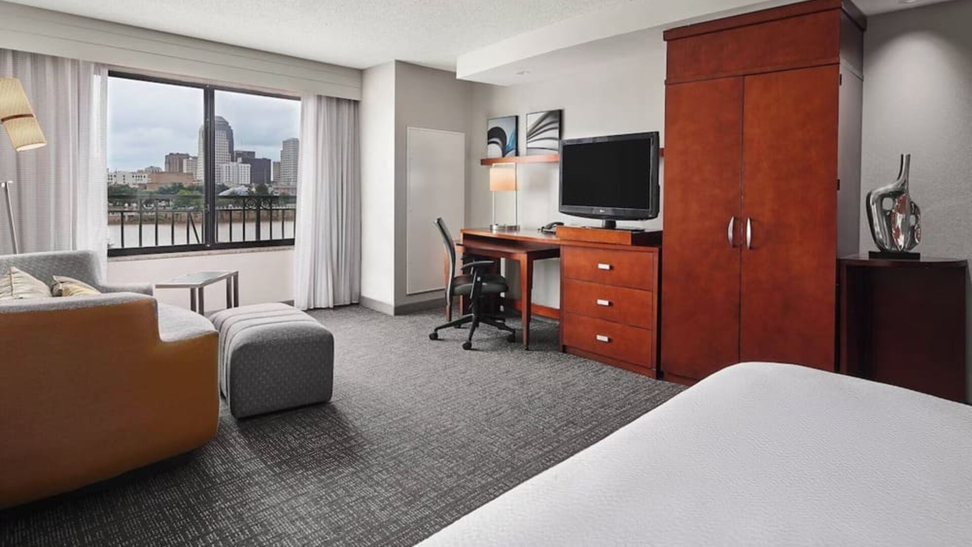 Day use room with living area at Courtyard Bossier City.