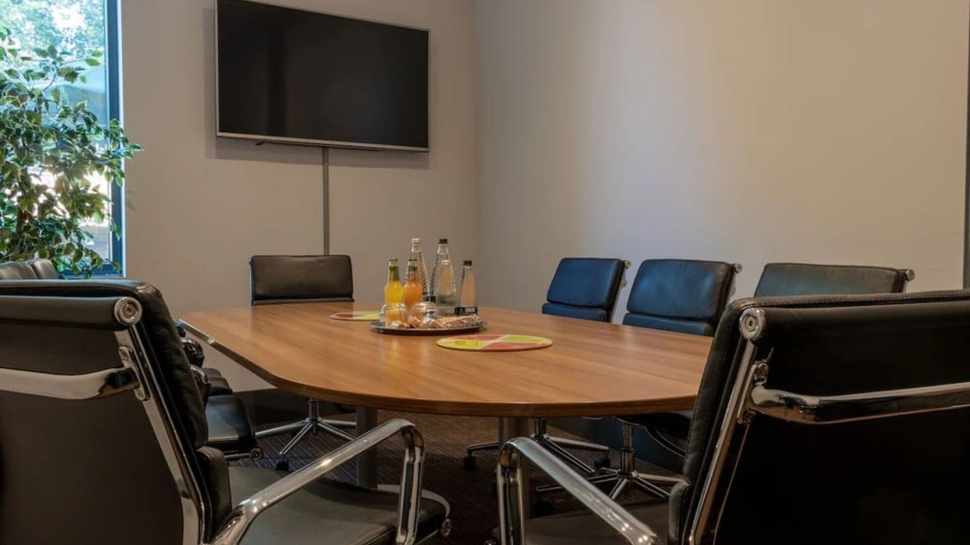 Professional meeting room at London City Airport Hotel.