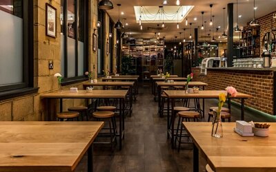 Hotel bar and seating area at London City Airport Hotel.