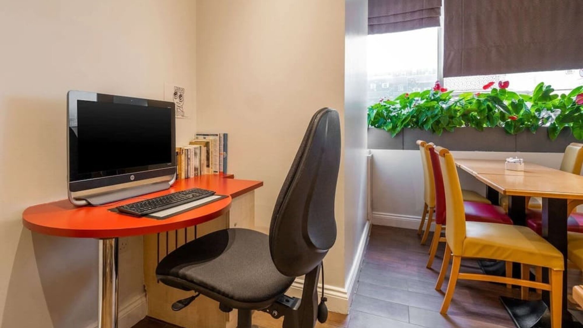 Workspace with computer and ergonomic chair at Comfort Inn Edgware Road.