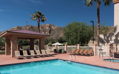 Refreshing outdoor pool at Courtyard By Marriott Santa Clarita Valencia.