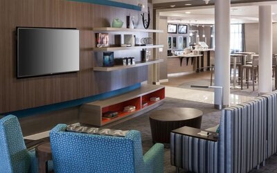 Lobby and coworking lounge at Courtyard By Marriott Santa Clarita Valencia.