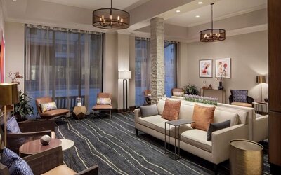 Lobby and coworking lounge at Embassy Suites By Hilton Fort Worth Downtown.
