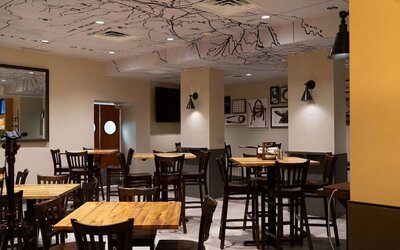 Dining area perfect for coworking at Embassy Suites By Hilton Fort Worth Downtown.
