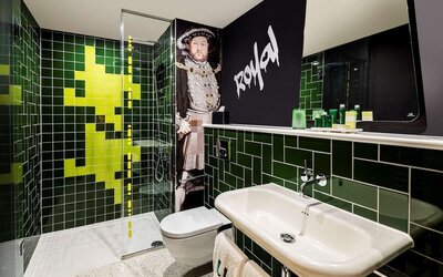 Guest bathroom with shower at nhow London.