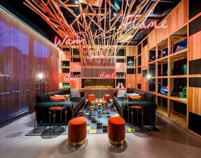 Cozy lobby with fireplace at nhow London.