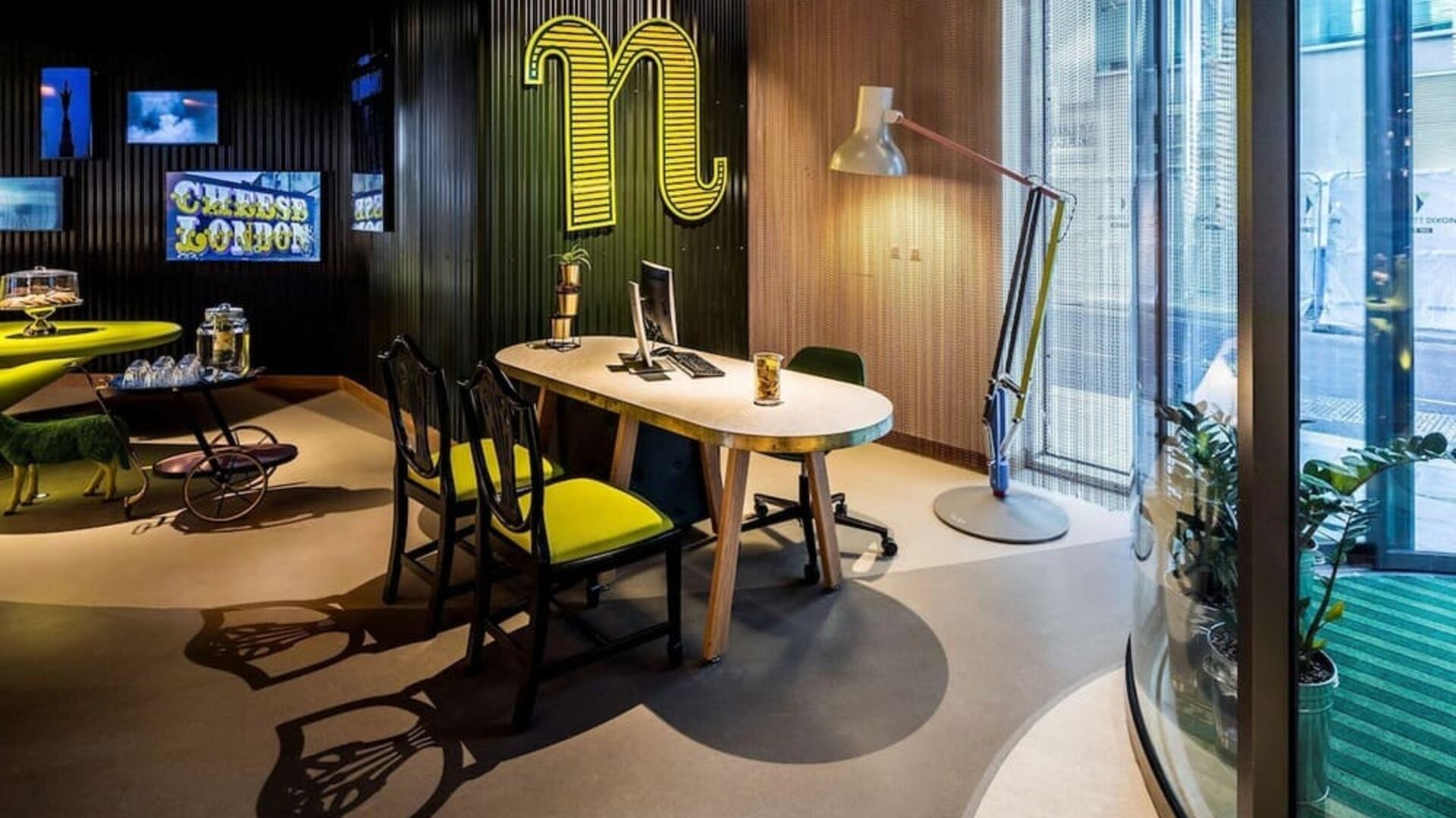 Business center with computer and ergonomic chairs at nhow London.