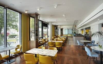 Dining area at Tower Suites Hotel by Blue Orchid.