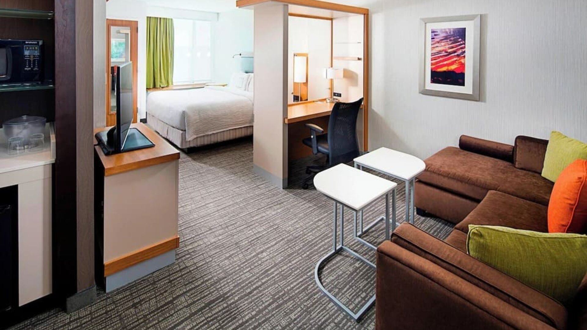 Day use room with living area at Springhill Suites Carle Place.
