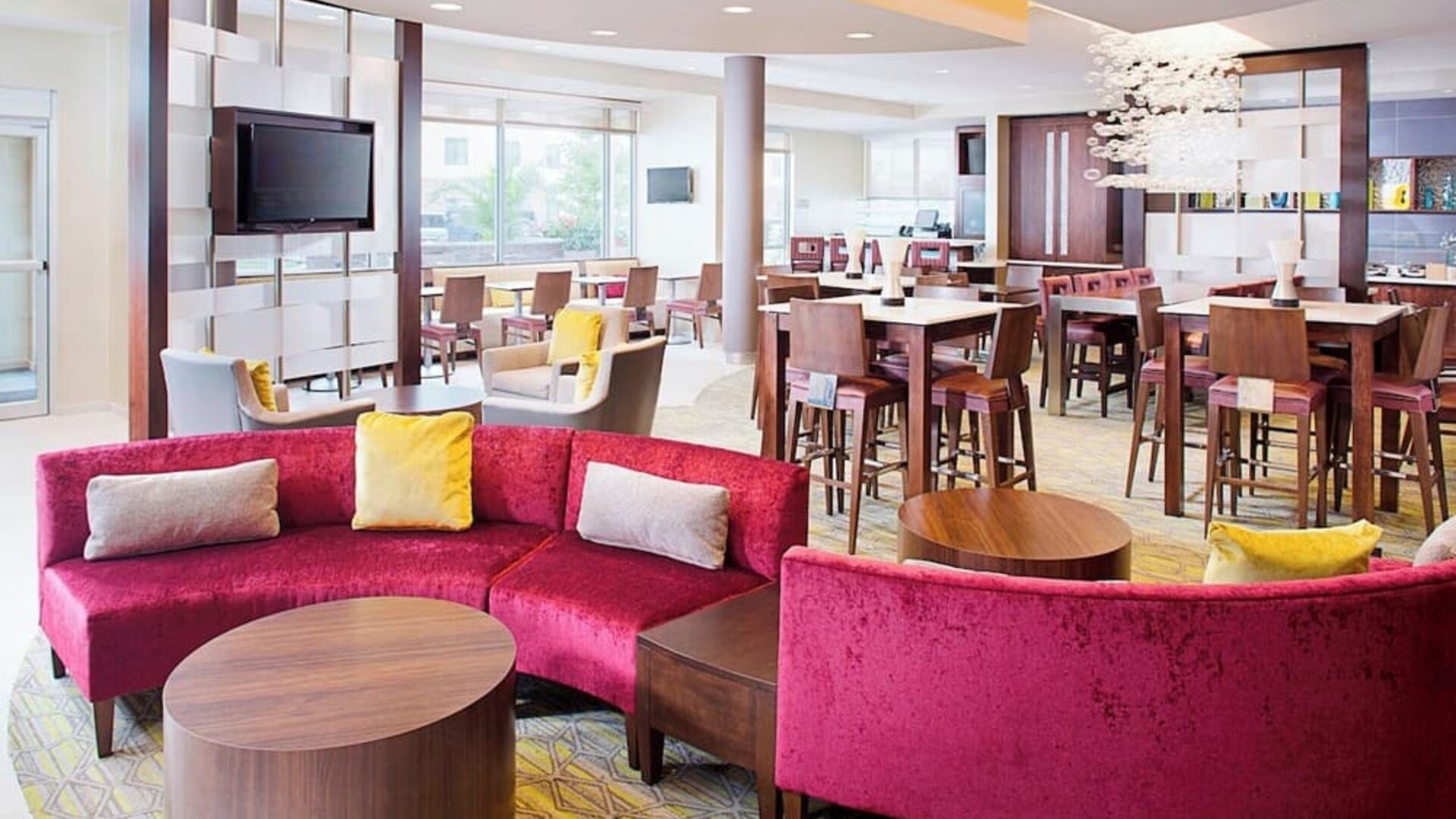 Lobby and coworking lounge at Springhill Suites Carle Place.
