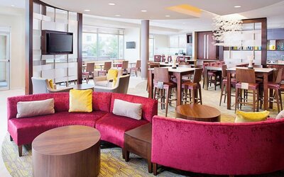 Lobby and coworking lounge at Springhill Suites Carle Place.