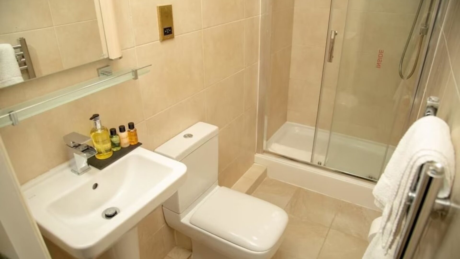 Guest bathroom with shower and free toiletries at The Ladbrooke Hotel.