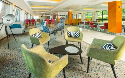 Comfortable lobby lounge at ibis Styles Birmingham NEC.