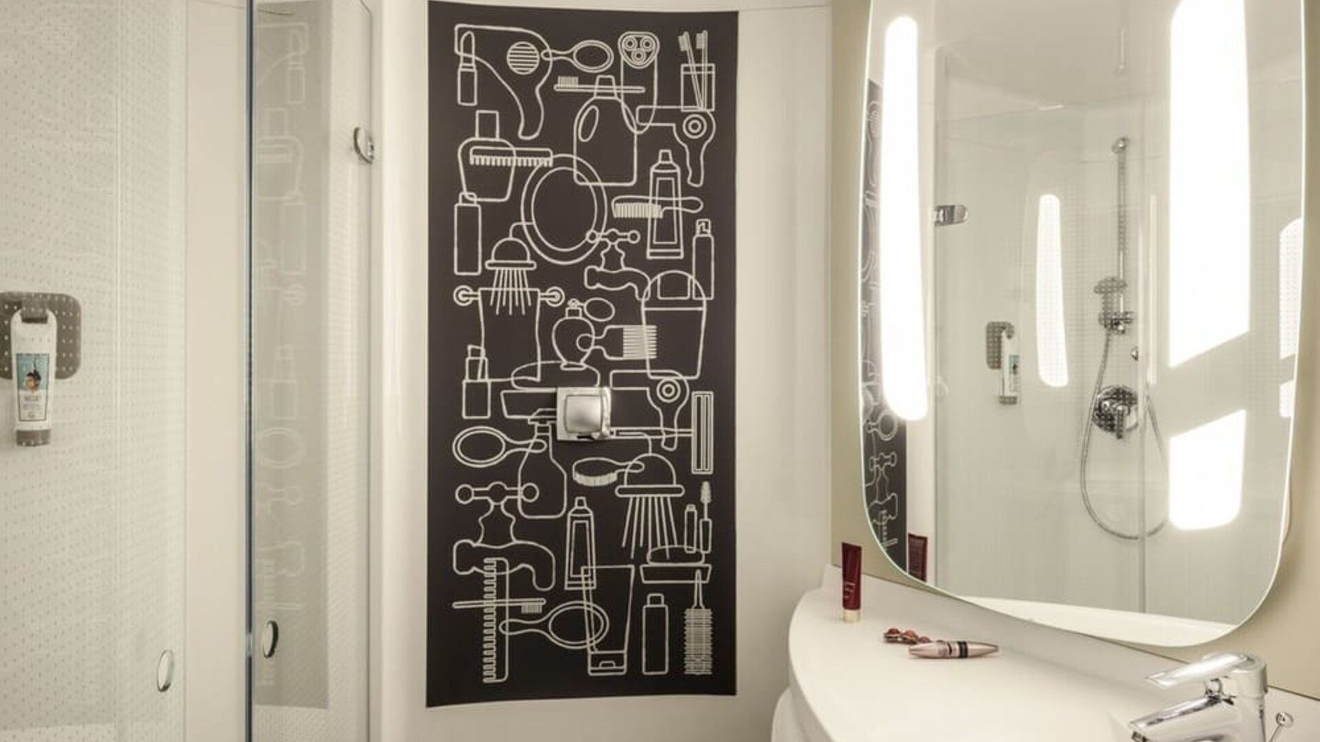 Private guest bathroom with shower at Ibis Birmingham Bordesley.