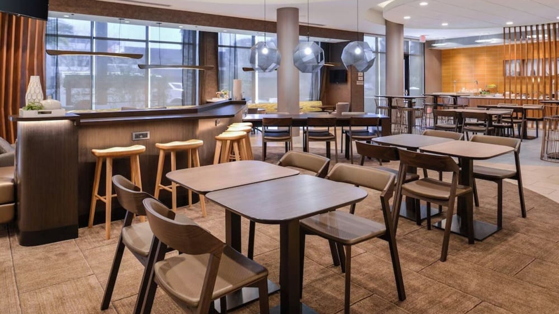 Dining area perfect for coworking at SpringHill Suites By Marriott Irvine John Wayne Airport/Orange County.