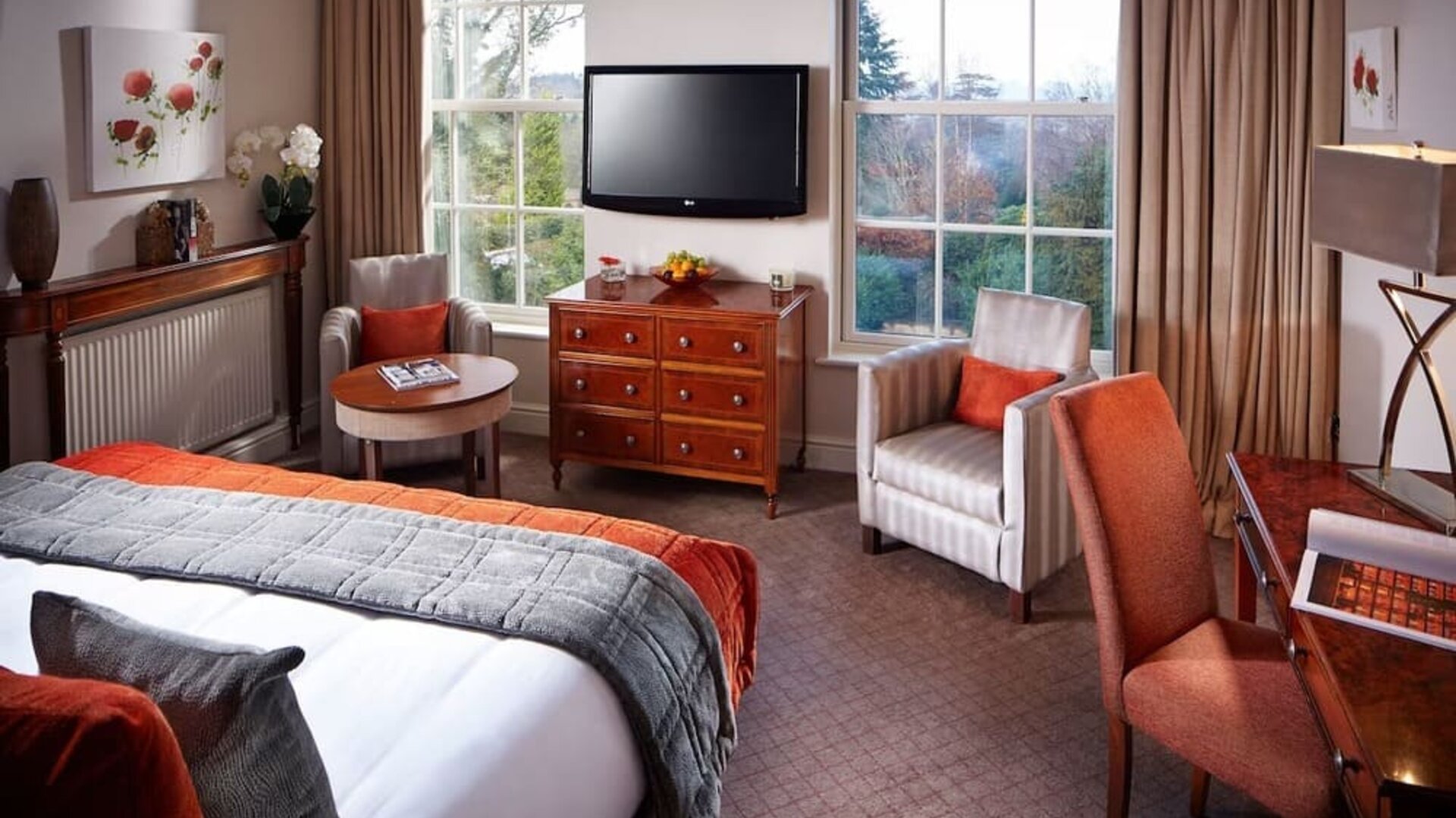 Day use king room with work desk and lounge seating at Alexander House Hotel And Utopia Spa Hotel.