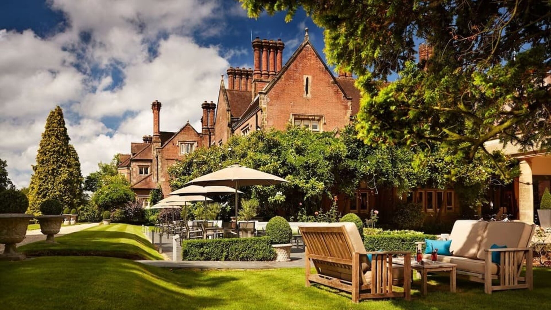 Hotel exterior with lounge area at Alexander House Hotel And Utopia Spa Hotel.