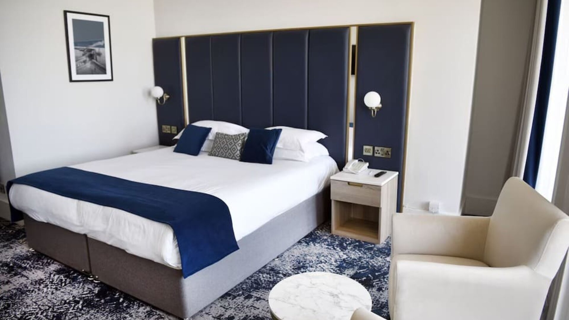 Day use room with lounge seating at Best Western Plus Dover Marina Hotel & Spa.