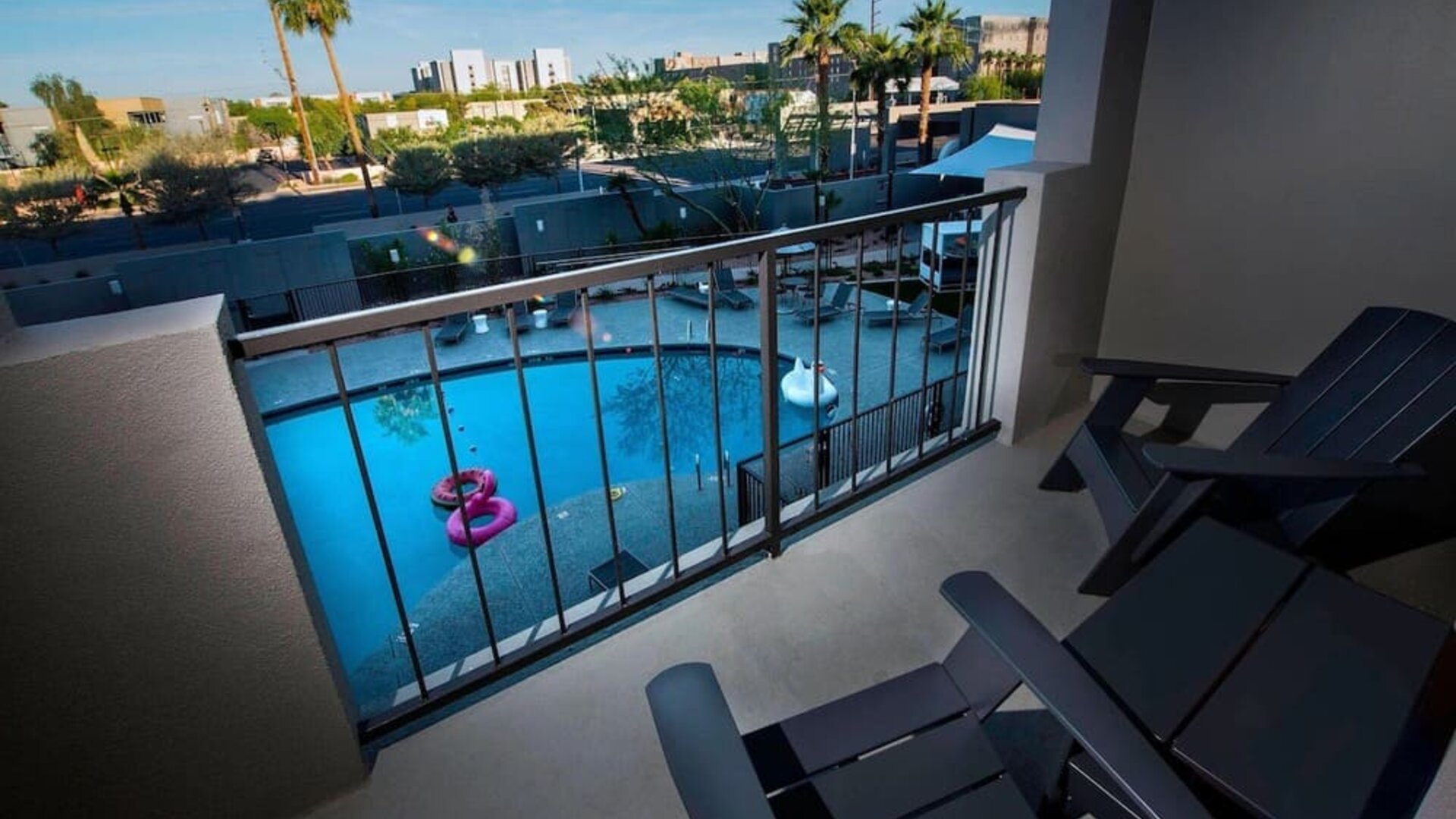 Balcony inside day use room with a view of the pool at Moxy Phoenix Tempe/ASU Area.