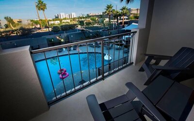 Balcony inside day use room with a view of the pool at Moxy Phoenix Tempe/ASU Area.