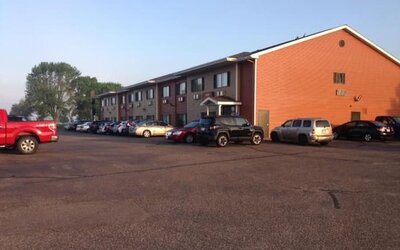 Parking area at Coratel Inn & Suites By Jasper New Richmond.