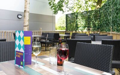 Terrace patio with lounge seating at Ibis Styles Haydock.