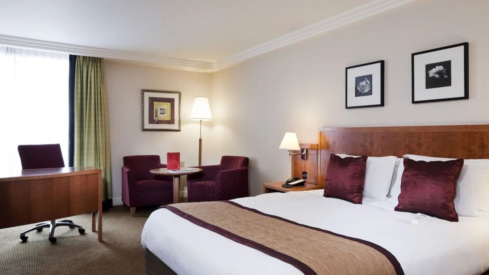 Standard day use room with work desk, lounge seating and private bathroom at Crowne Plaza London - Heathrow.