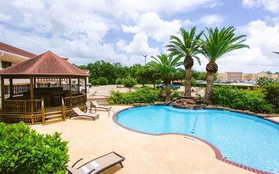 Refreshing outdoor pool at Best Western Pearland Inn.